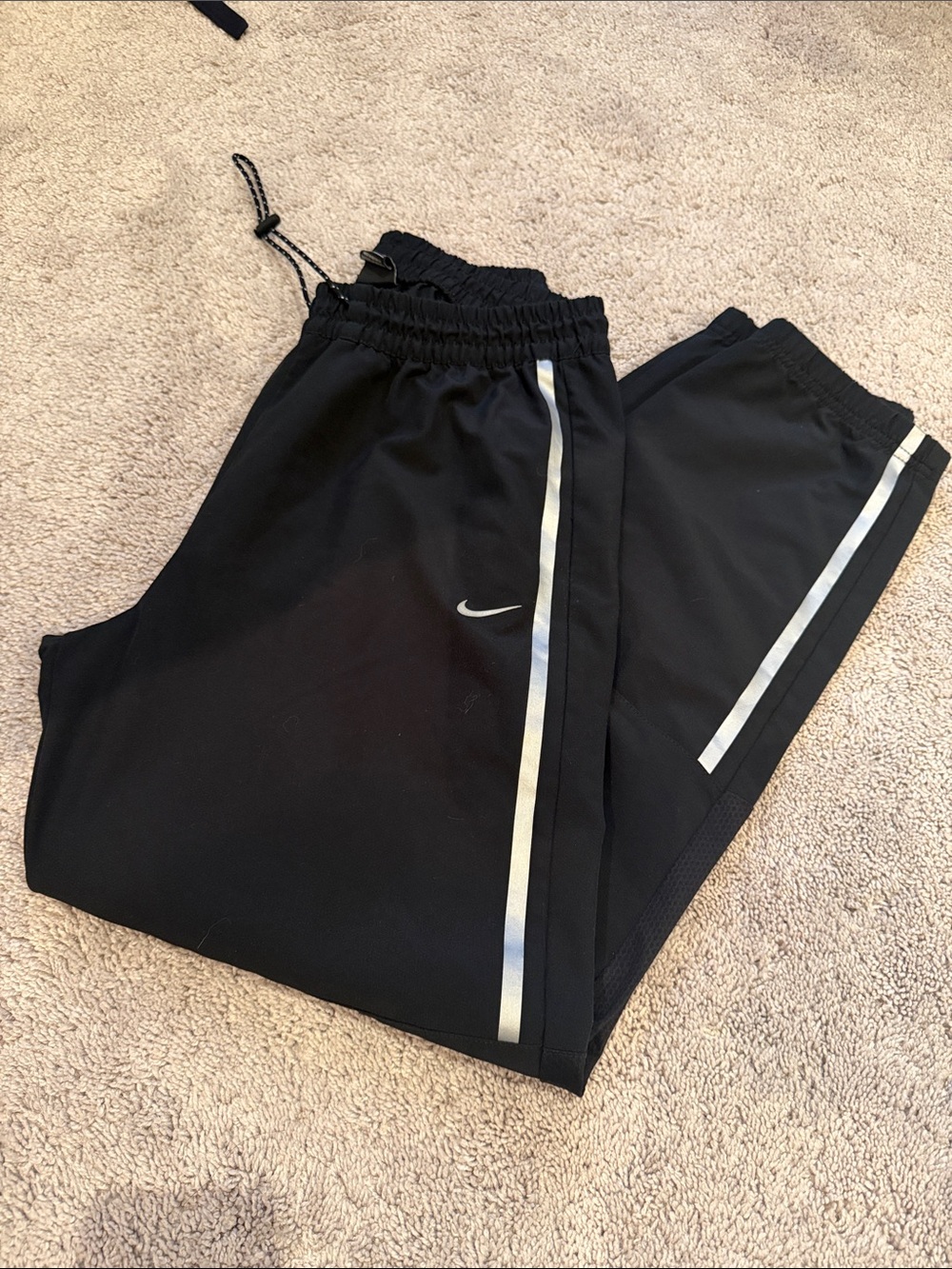 Nike Black Track Pants with Silver Reflective Stripes